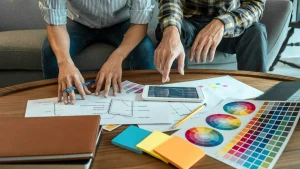Homeowner selecting exterior paint color samples