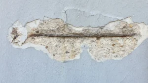 Hail damage on exterior house paint