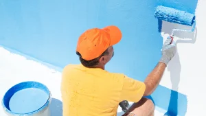 Freshly painted pool house with mildew-resistant exterior paint