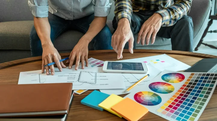 Homeowner selecting exterior paint color samples