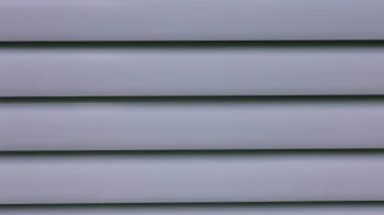Freshly painted vinyl siding on home exterior